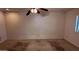 Spacious bedroom featuring a ceiling fan and neutral-toned walls at 3323 N 103Rd Ave, Avondale, AZ 85392