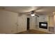 Cozy bedroom featuring a fireplace and a ceiling fan at 3323 N 103Rd Ave, Avondale, AZ 85392