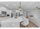 Spacious kitchen with stainless steel appliances, a large island, and ample cabinet space at 35701 N Bandolier Dr, San Tan Valley, AZ 85144