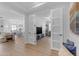 Bright living room featuring hardwood floors, open floor plan, and natural light at 35701 N Bandolier Dr, San Tan Valley, AZ 85144