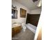 Standard bathroom featuring a single sink vanity, toilet, and a bathtub with tiled surround at 3701 W Keim Dr, Phoenix, AZ 85019