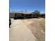 Single level brick home with attached garage and dry landscaping in need of renovation at 3701 W Keim Dr, Phoenix, AZ 85019