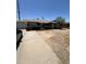 Single level brick home with attached garage and dry landscaping in need of renovation at 3701 W Keim Dr, Phoenix, AZ 85019