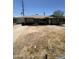 Single level brick home with attached garage and dry landscaping in need of renovation at 3701 W Keim Dr, Phoenix, AZ 85019