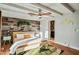 Comfortable bedroom with modern ceiling fan, wood accent wall and attached bathroom at 4036 N 40Th Pl, Phoenix, AZ 85018