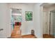 Welcoming foyer with hardwood floors and views of the dining area at 4036 N 40Th Pl, Phoenix, AZ 85018