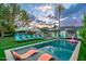 Inviting backyard featuring a sparkling pool, lounge chairs, and manicured landscaping at 4036 N 40Th Pl, Phoenix, AZ 85018