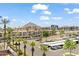 Elevated view showcases community buildings, palm trees, and Camelback Mountain at 4200 N Miller Rd # 504, Scottsdale, AZ 85251