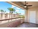 Balcony featuring palm tree views, ceiling fan and patterned railing at 4200 N Miller Rd # 504, Scottsdale, AZ 85251
