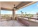 Balcony with tile flooring and patterned dividers offering an attractive city view at 4200 N Miller Rd # 504, Scottsdale, AZ 85251