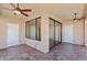 Enclosed patio with slate tile floors and ceiling fans, great for entertaining at 4200 N Miller Rd # 504, Scottsdale, AZ 85251