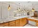 Large bathroom with granite counter tops and multiple sinks at 4200 N Miller Rd # 504, Scottsdale, AZ 85251