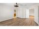 Bedroom view to kitchen features hardwood floors and modern lighting at 4200 N Miller Rd # 504, Scottsdale, AZ 85251