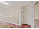 View of the entry door of a unit, featuring a decorated hallway and a unit number 504 at 4200 N Miller Rd # 504, Scottsdale, AZ 85251