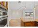 Bright kitchen with modern lighting and a view at 4200 N Miller Rd # 504, Scottsdale, AZ 85251