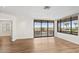 Neutral living room with sliding glass door leading to outdoor balcony with mountain views at 4200 N Miller Rd # 504, Scottsdale, AZ 85251