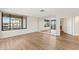 Spacious living room with wood floors, lots of natural light and ample space at 4200 N Miller Rd # 504, Scottsdale, AZ 85251