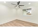 Cozy bedroom featuring ceiling fan, recessed lighting, and a large window at 4701 N 63Rd Dr, Phoenix, AZ 85033