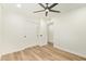 Bright bedroom featuring ceiling fan, recessed lighting, closet with sliding door and luxury vinyl floors at 4701 N 63Rd Dr, Phoenix, AZ 85033