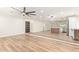 Bright living room featuring wood floors and modern design with an open floor plan at 4701 N 63Rd Dr, Phoenix, AZ 85033