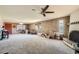 Spacious living room with brick walls, carpeting, and a fireplace at 5343 W Coronado Rd, Phoenix, AZ 85035