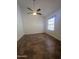 Spacious bedroom has tile floors, ceiling fan, and natural light at 602 N May St # 65, Mesa, AZ 85201
