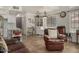 Open-concept living space with tile floors seamlessly integrates the kitchen, dining, and living areas at 602 N May St # 65, Mesa, AZ 85201