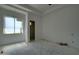 This bedroom has fresh paint, trim and a window, ready for its final touches at 6426 E Turquoise Ave, Paradise Valley, AZ 85253