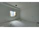 Light-filled bedroom featuring a sleek tray ceiling and natural light at 6426 E Turquoise Ave, Paradise Valley, AZ 85253
