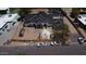 Aerial view of a new construction home with the roof installed and cars parked outside at 6426 E Turquoise Ave, Paradise Valley, AZ 85253