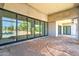 A covered patio with large sliding glass doors offers seamless indoor-outdoor living at 6426 E Turquoise Ave, Paradise Valley, AZ 85253