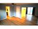 Bright bedroom featuring wood floors, a closet, and neutral wall paint at 8848 N New World Dr, Glendale, AZ 85302