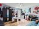 Versatile bedroom with hardwood floors, ample storage, and a sliding glass door to the private patio, perfect for guests at 8848 N New World Dr, Glendale, AZ 85302