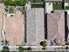 Aerial view of the property showing the roof, landscaping, and surrounding neighborhood at 10165 E Gamma Ave, Mesa, AZ 85212