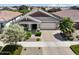 Beautiful home with a well manicured yard, desert landscaping, and paver driveway from above at 10165 E Gamma Ave, Mesa, AZ 85212
