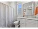 Well-lit bathroom with a granite countertop, modern vanity, and a shower and tub combo at 10165 E Gamma Ave, Mesa, AZ 85212