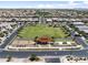 Aerial view of a community park with green space, playground, and recreational areas at 10165 E Gamma Ave, Mesa, AZ 85212