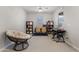 Bright office with a large desk area, comfortable chair, and music workstation at 10165 E Gamma Ave, Mesa, AZ 85212