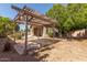 Backyard featuring a pergola, patio, and pool, offering an ideal outdoor entertaining space at 1028 S Valle Verde --, Mesa, AZ 85208