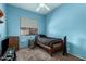 Stylish blue bedroom with good natural light and modern necessities at 1028 S Valle Verde --, Mesa, AZ 85208