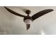 Modern ceiling fan with sleek blades and integrated lighting at 12421 N 41St Pl, Phoenix, AZ 85032