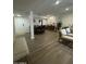 Open living space with tile flooring and sightlines to dining area at 12421 N 41St Pl, Phoenix, AZ 85032