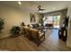 Comfortable living room with sliding glass doors to backyard and modern decor at 12421 N 41St Pl, Phoenix, AZ 85032