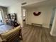 Inviting living room with wood-look floors, decorative art, and neutral decor at 12421 N 41St Pl, Phoenix, AZ 85032