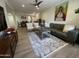 Spacious living room area with contemporary decor and an open floor plan at 12421 N 41St Pl, Phoenix, AZ 85032