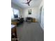 Bright home office with dual workstations, a ceiling fan, and modern decor, perfect for working from home at 12421 N 41St Pl, Phoenix, AZ 85032