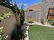 Landscaped backyard featuring turf and flowers at 12421 N 41St Pl, Phoenix, AZ 85032