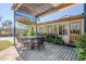 Backyard features an outdoor dining area with mature landscaping, a mural and plenty of space at 1274 E Edgemont Ave, Phoenix, AZ 85006