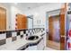 A bathroom featuring black and white checkered tiles around the sink at 1274 E Edgemont Ave, Phoenix, AZ 85006