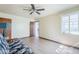 Comfortable bedroom with light walls, a window, and wood-look flooring at 1274 E Edgemont Ave, Phoenix, AZ 85006